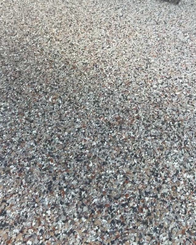 Scraping loose flake off a cured floor